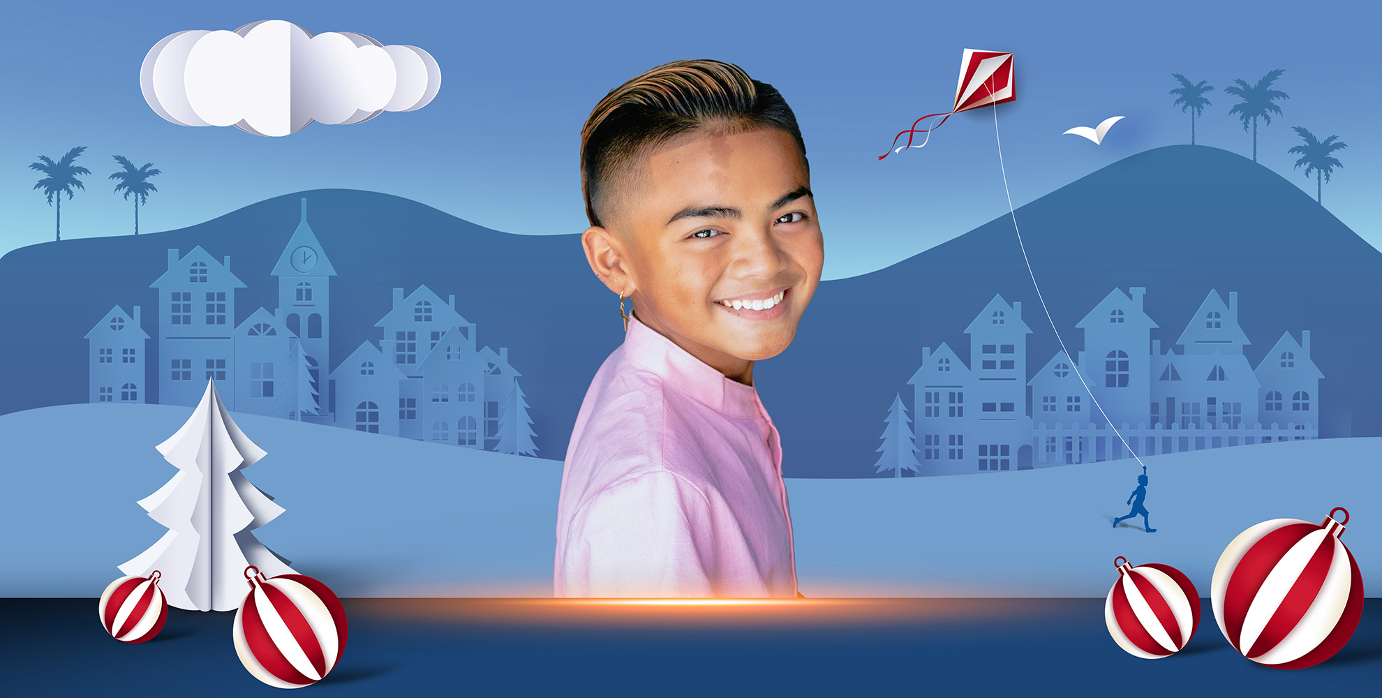 boy wearing pink shirt with blue background