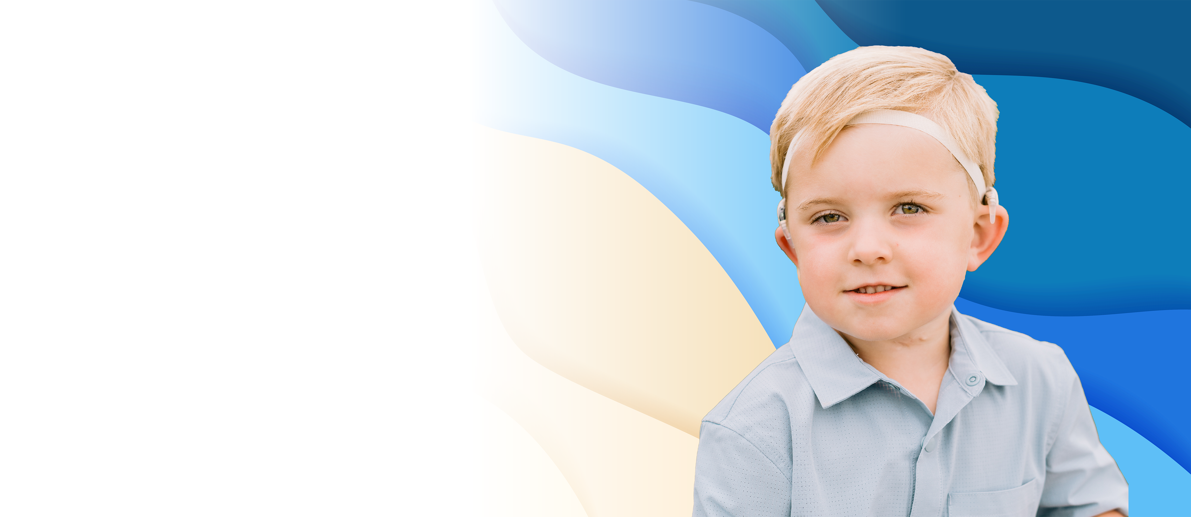 young boy with blond hair and wavy blue background