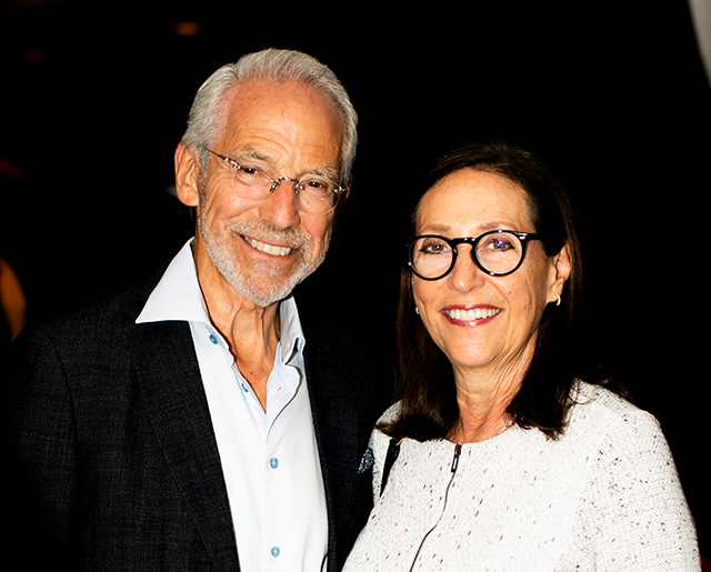 Man and woman smiling