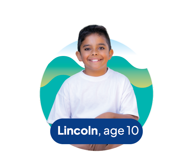 boy wearing white shirt and smiling