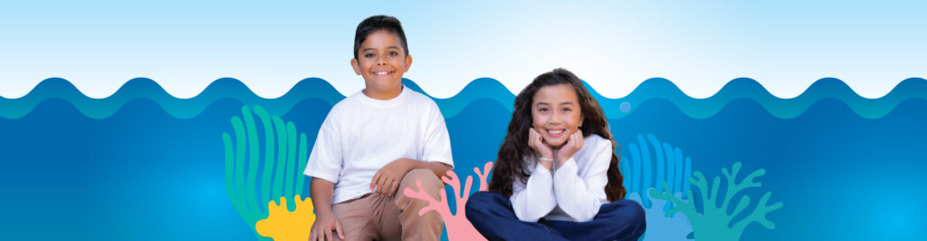 boy and girl smiling at camera with animated ocean background